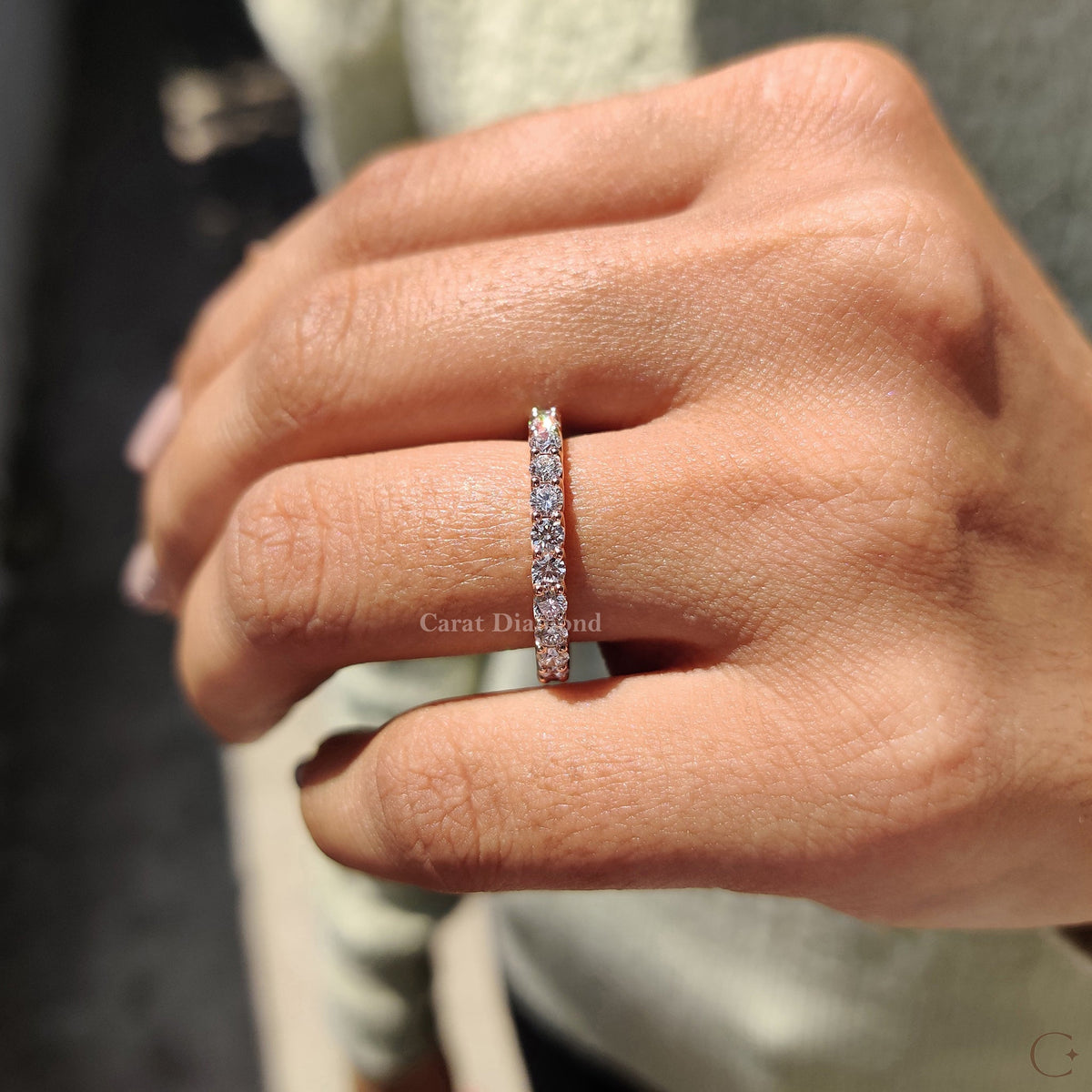 Custom wedding band with options for personalized diamond settings.