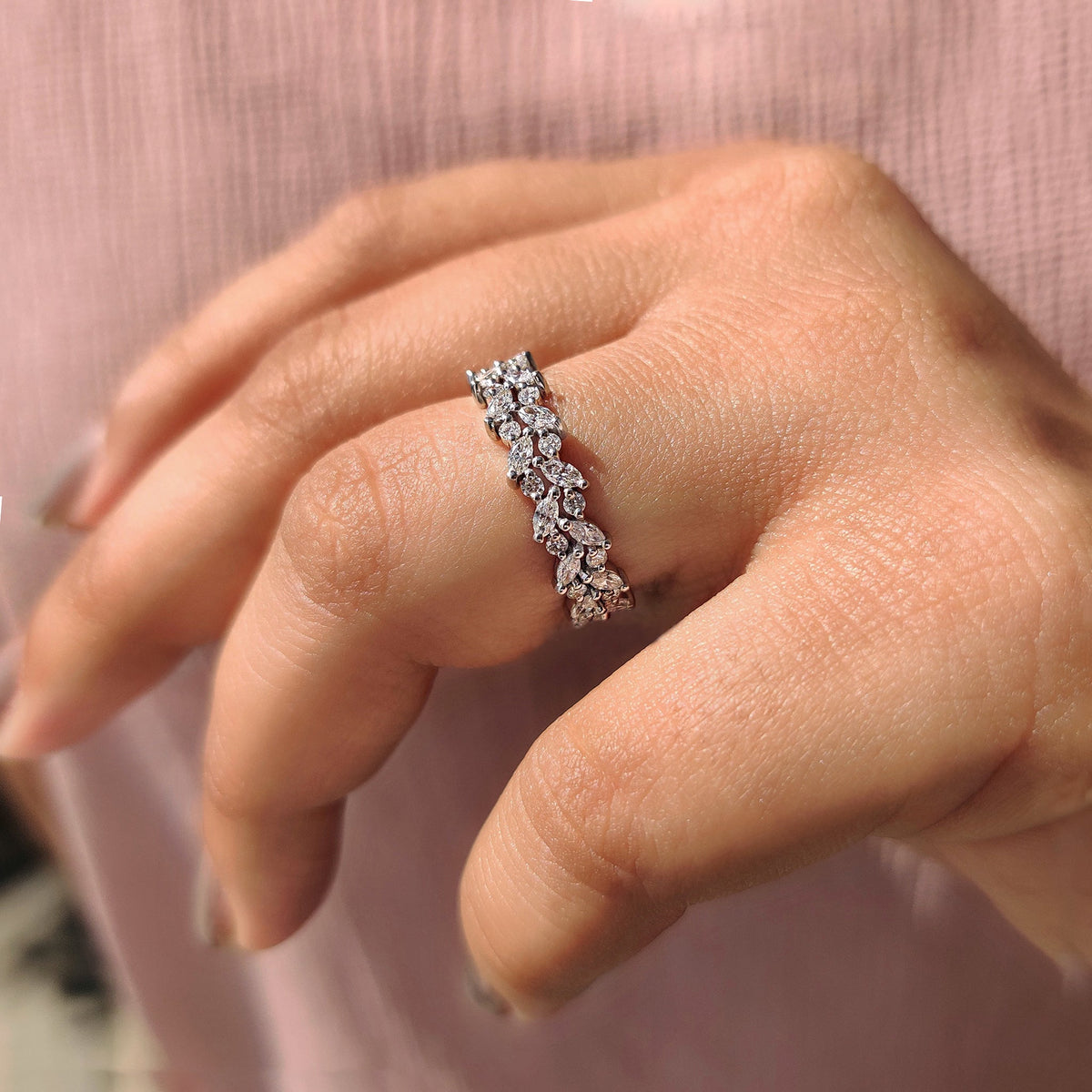 Marquise and round wedding band in white gold.
