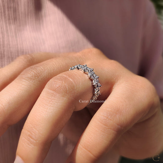 Double row band featuring marquise and round diamonds.