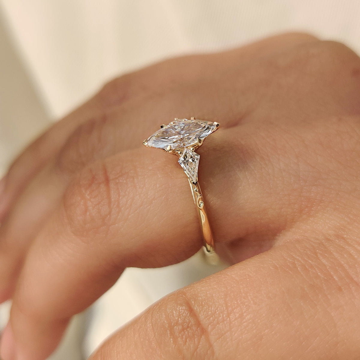 Vintage style marquise diamond ring with kite side stones