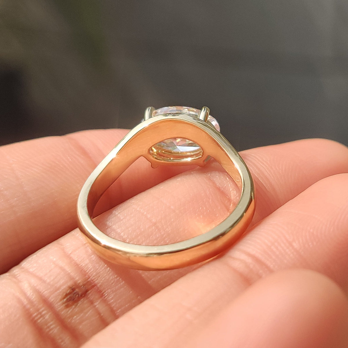 Oval cut diamond ring with clean solitaire design
