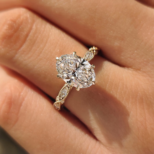 Handmade oval lab grown diamond ring with six claw prongs