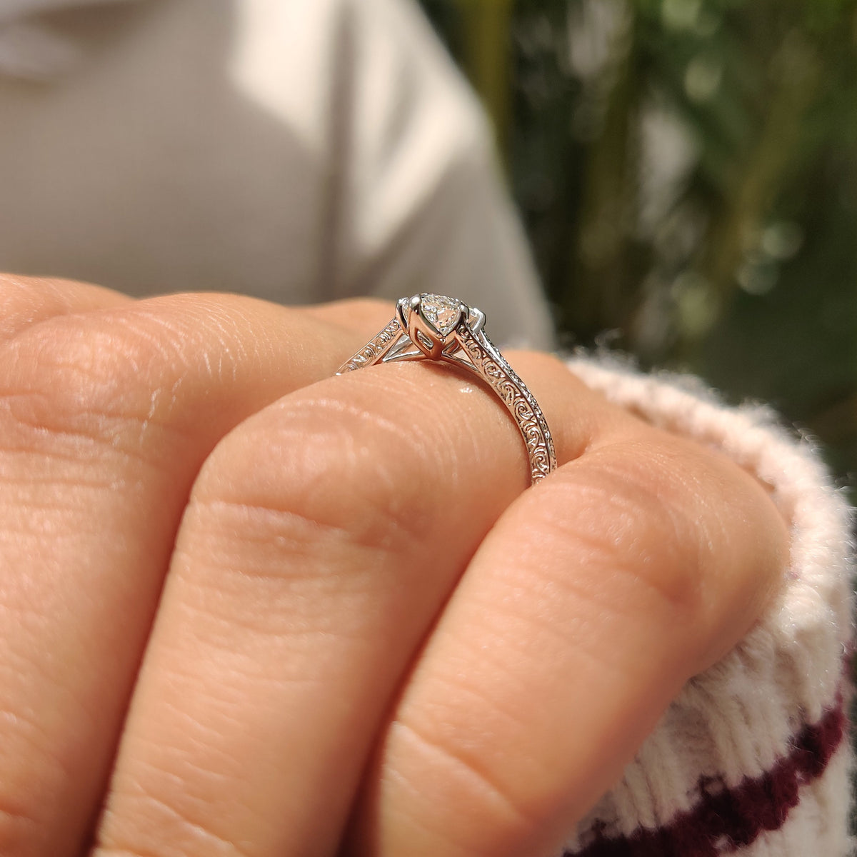 Handmade marquise solitaire ring with tulip setting and prongs.