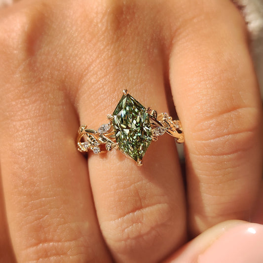 Nature inspired diamond ring with leaf detail and prongs