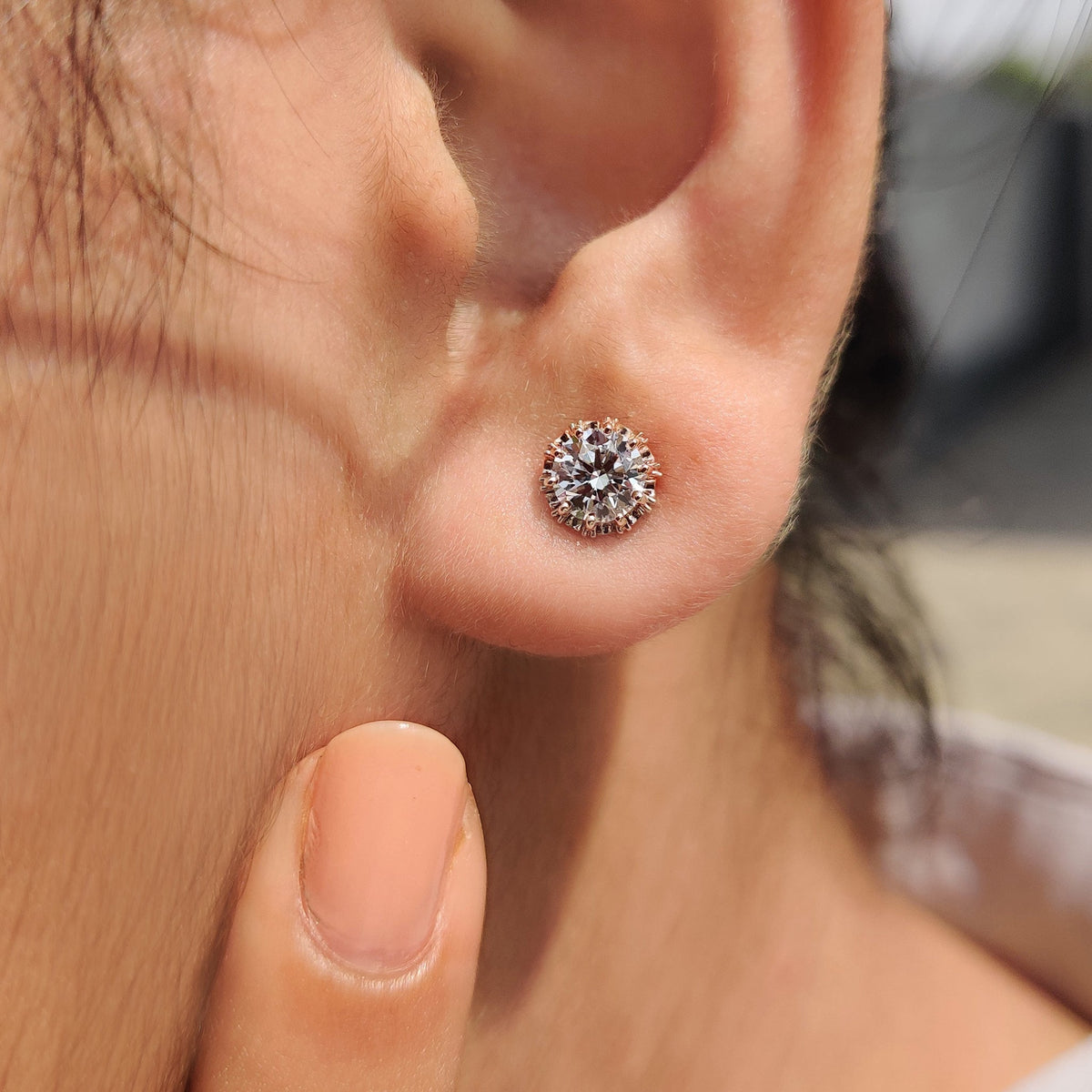 Rose gold earrings with a delicate finish.