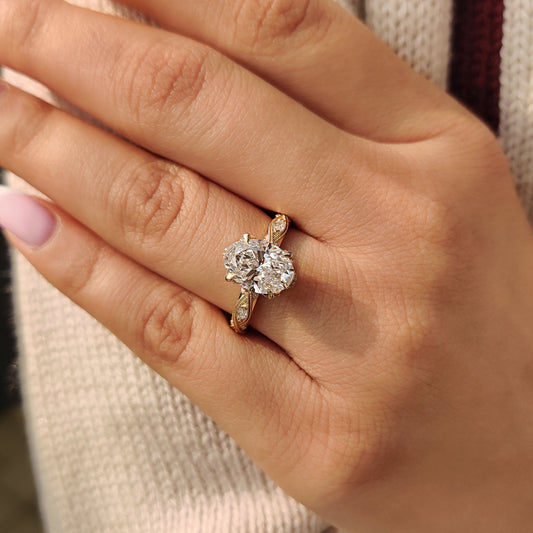 Vintage engagement ring with milgrain setting detail.