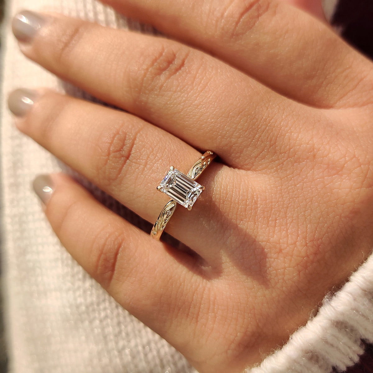 Engraved shank diamond engagement ring.