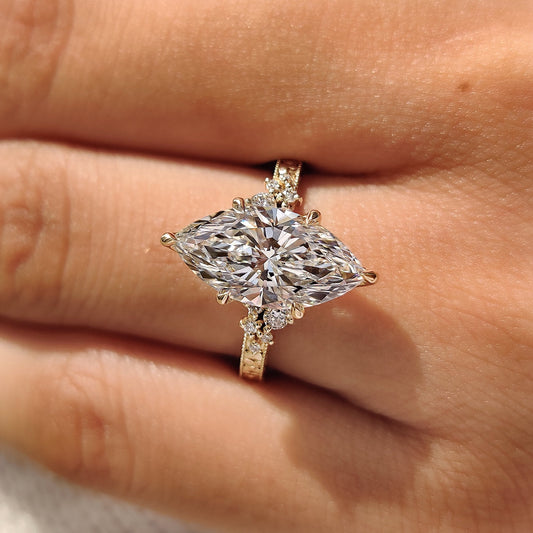 Marquise ring with six claw prong setting