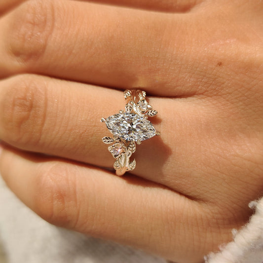Lab grown marquise diamond ring with cluster setting design