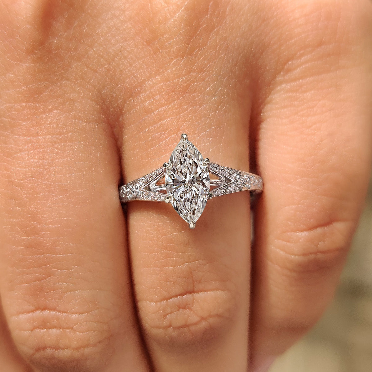 Lab grown marquise diamond ring with vintage tulip setting.