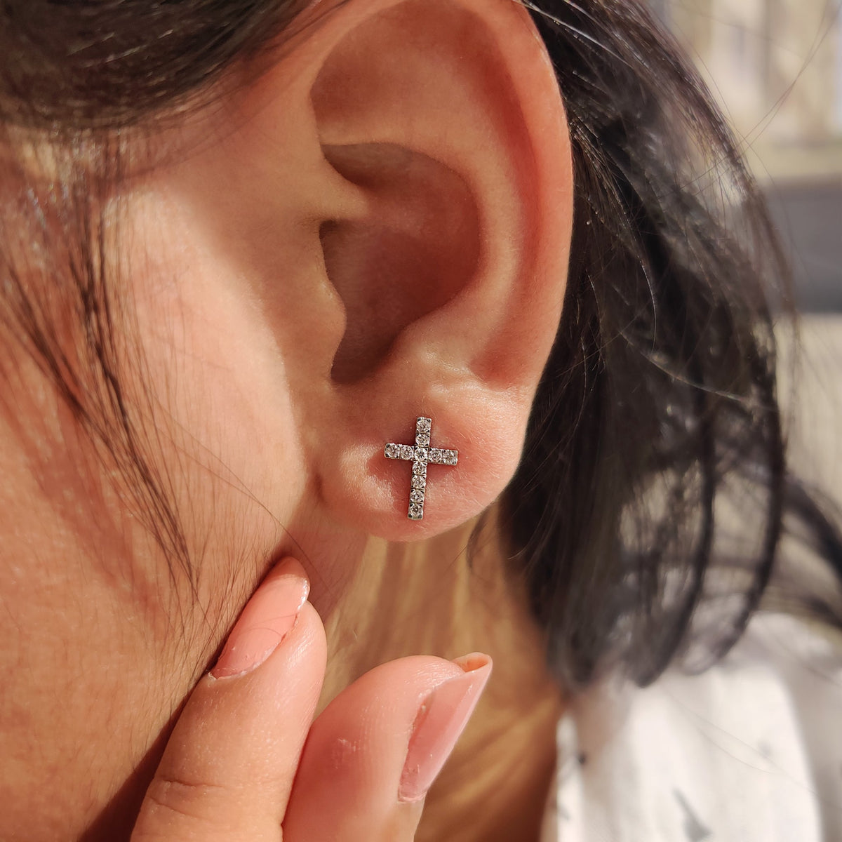 Handmade earrings with lab grown diamond studs in white gold.