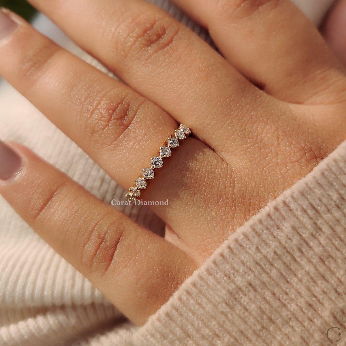 Lab grown diamond band for a modern bride, set in a half eternity wedding band style.