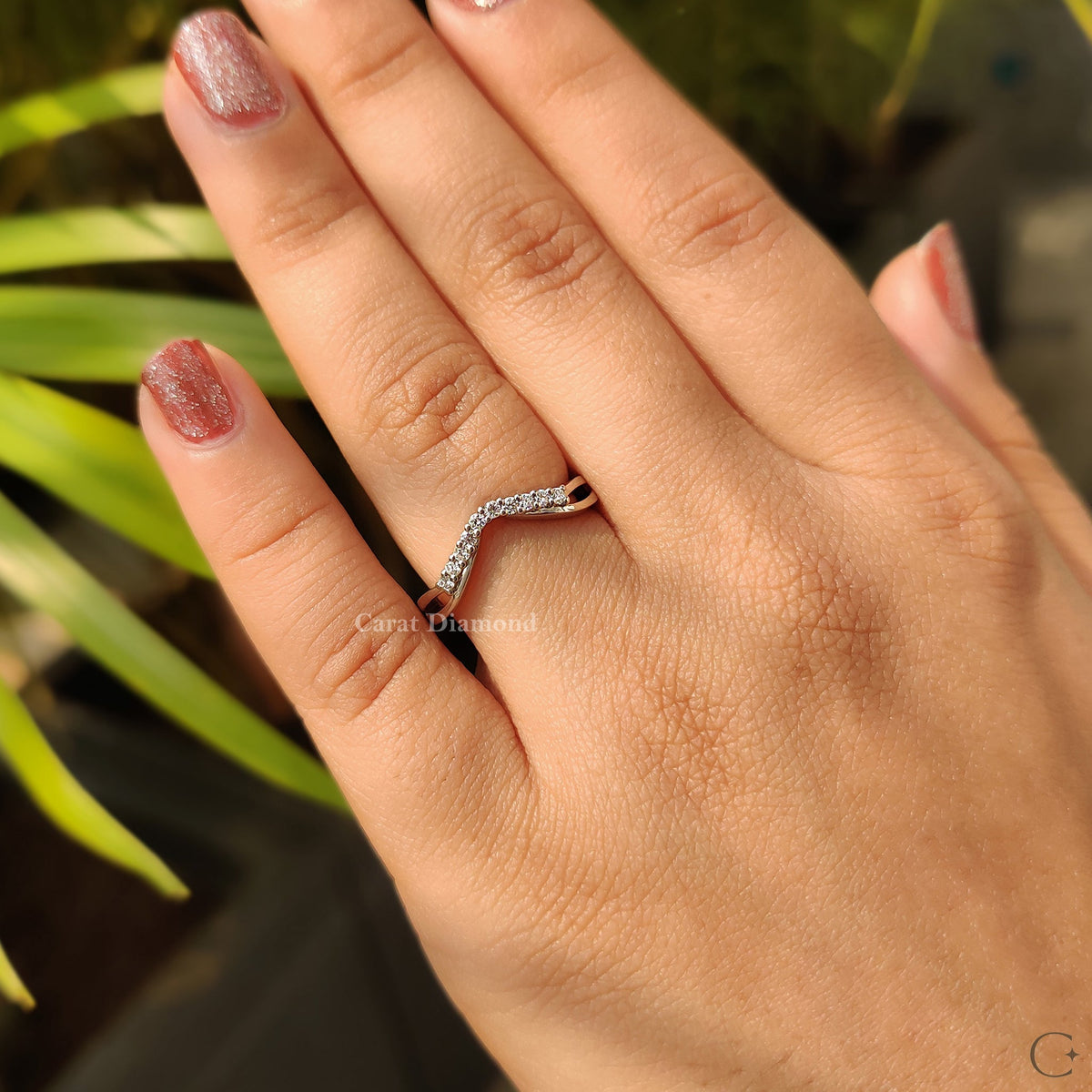 Carat Diamonds wedding band with a timeless look.