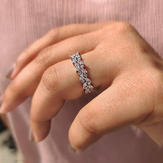 Marquise and round wedding band in white gold.