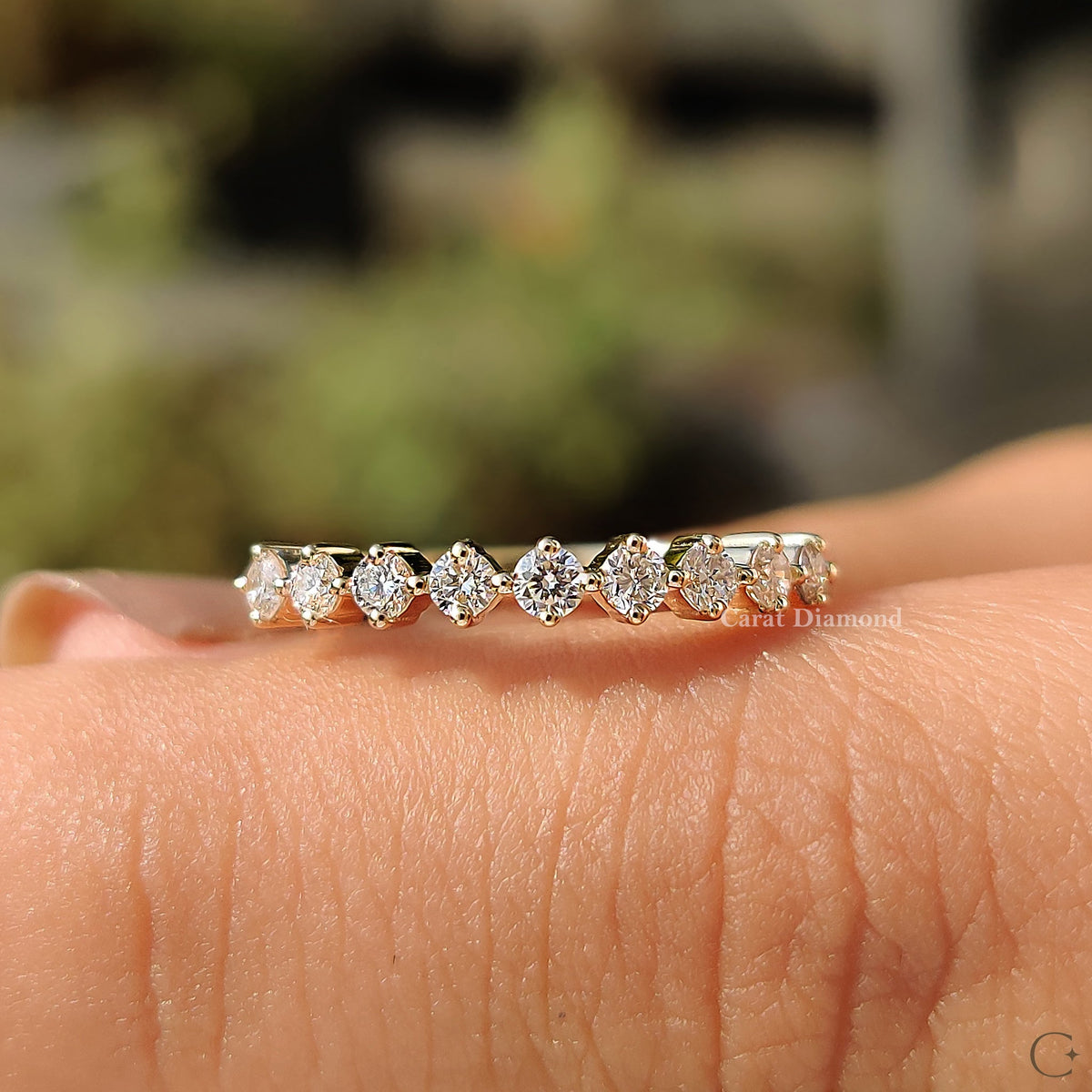 Custom wedding band in yellow gold with ethically sourced lab grown diamond.
