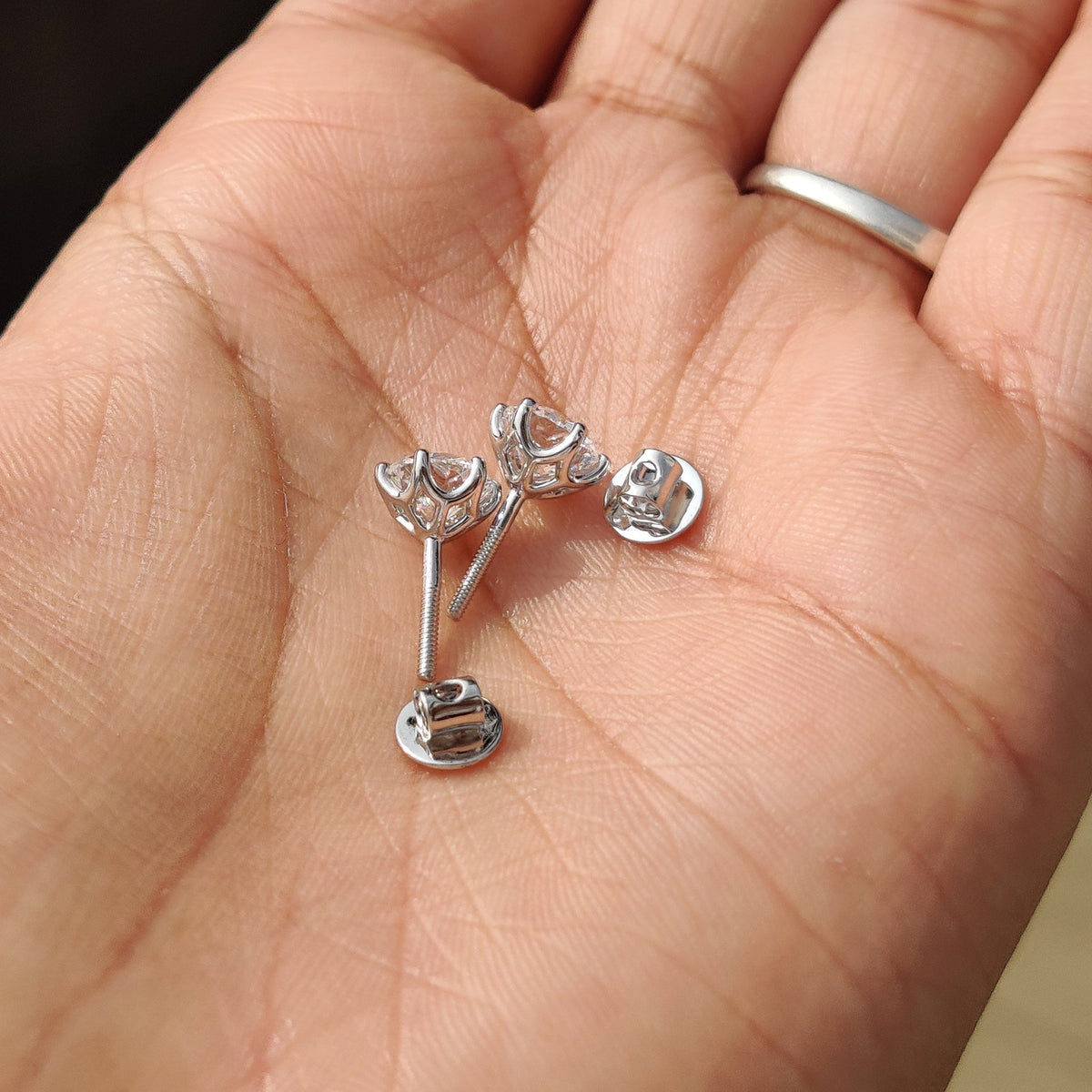 Classic diamond stud earrings with lab grown stones.