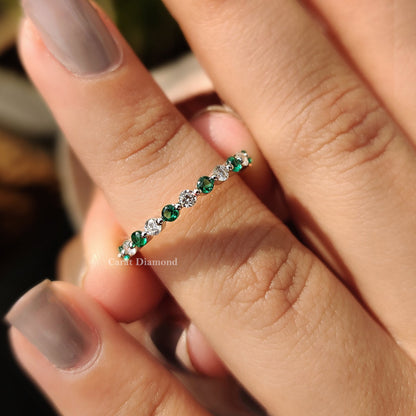 Gorgeous emerald and diamond wedding band from Carat Diamonds.