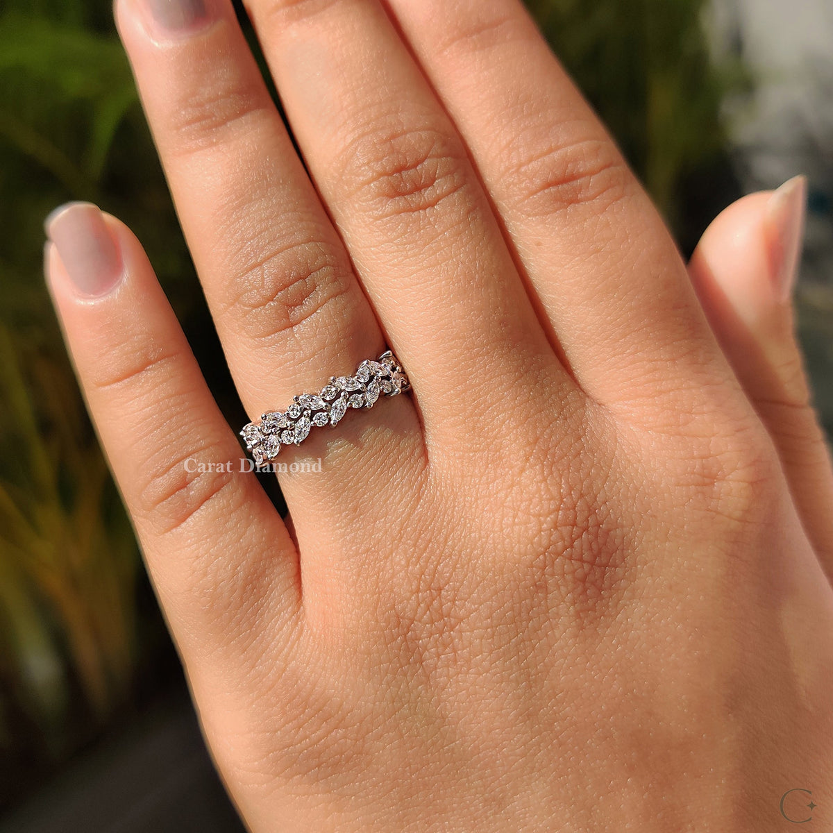 Lab grown diamond band with prong setting.