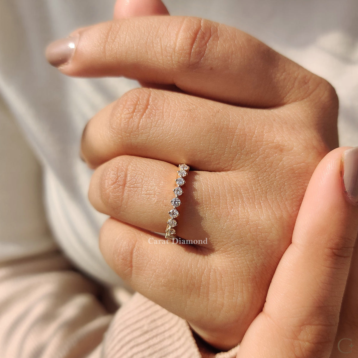 Minimalist wedding band with prong setting, ideal for a stylish wedding band stack.