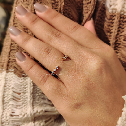Yellow gold band displayed on a velvet surface.