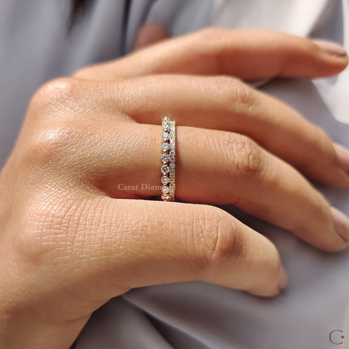 Yellow Gold Wedding Band featured on a soft fabric backdrop.