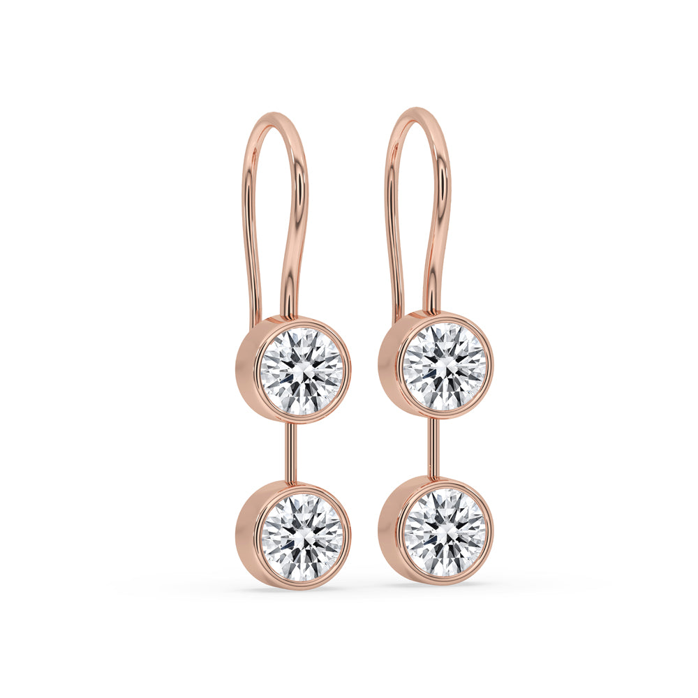 Rose gold diamond earrings crafted as elegant handmade jewelry for timeless style.