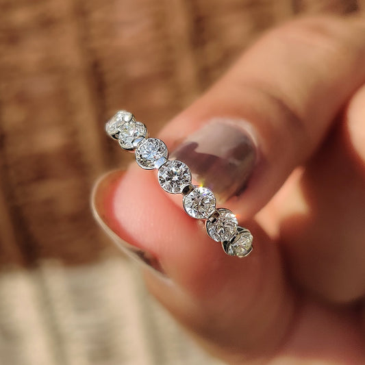 Double Wedding Band in white gold with round cut diamond.