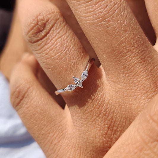 Three stone wedding band featuring lab grown diamonds in white gold.