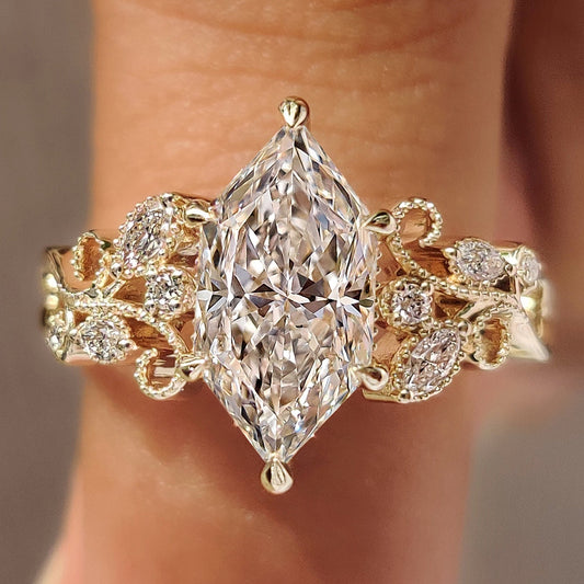 Dutch marquise ring with leaf and vine shank design