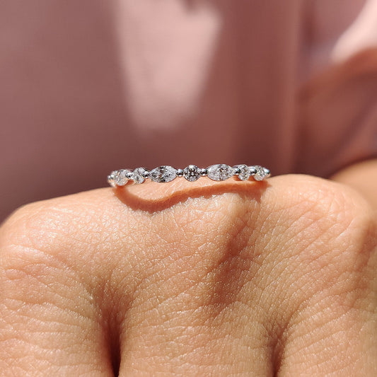 Marquise diamond wedding band with brilliant sparkle.