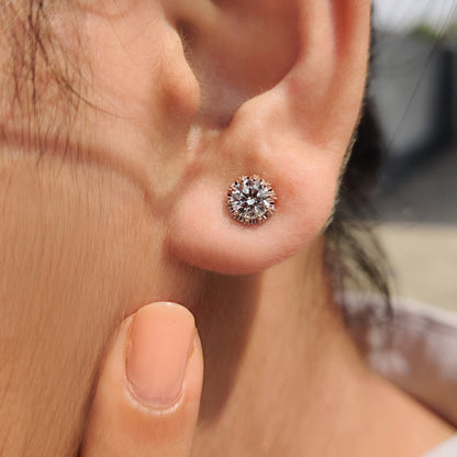 Rose gold earrings with a delicate finish.