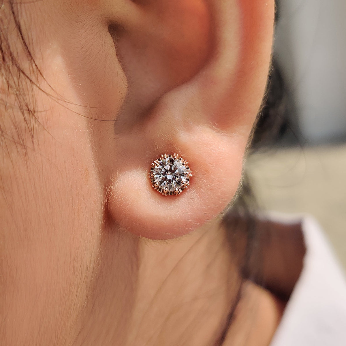 Stud earrings with lab grown diamonds for brilliance.