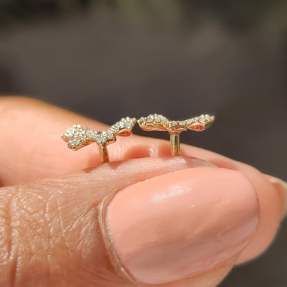 Lab grown diamond bow earrings crafted in yellow gold