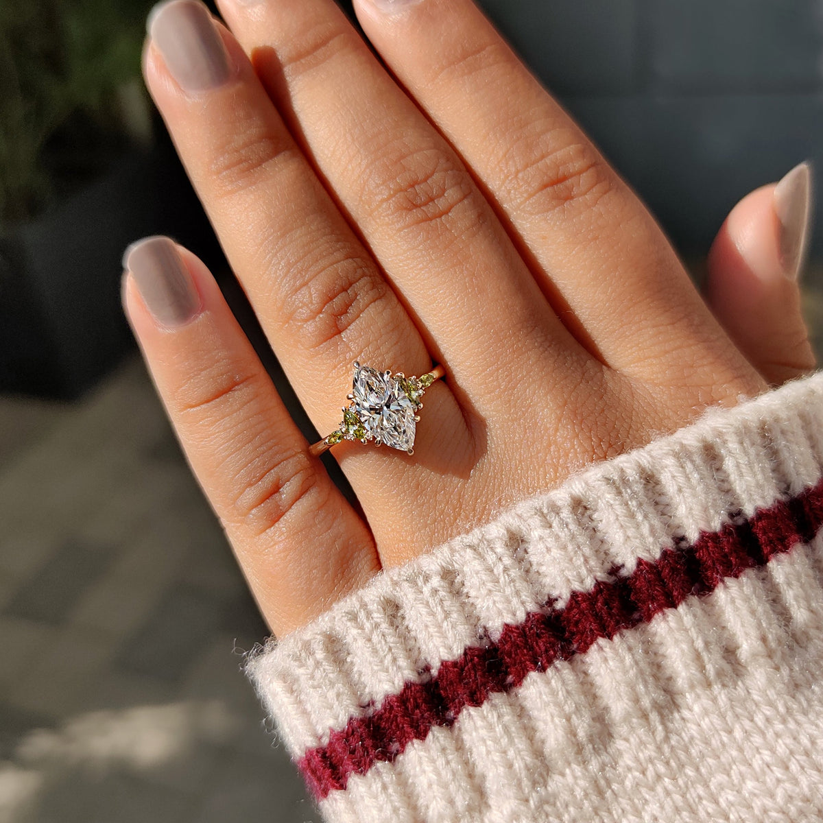 Marquise diamond ring with secure six claw prong design.