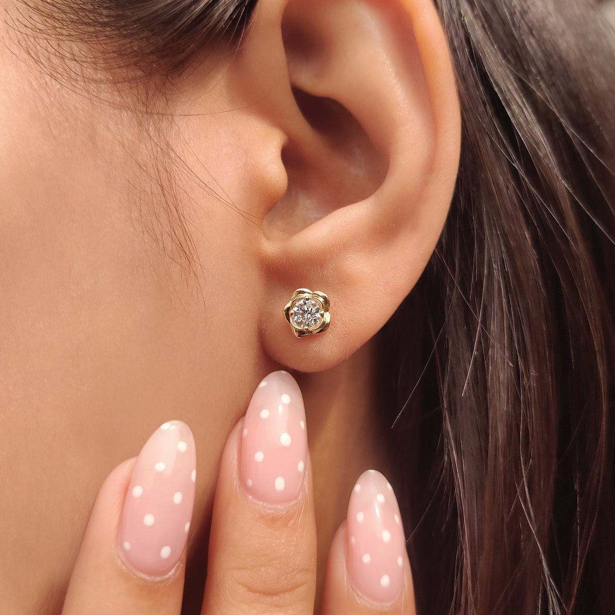 Lab grown diamond flower earrings stud style.
