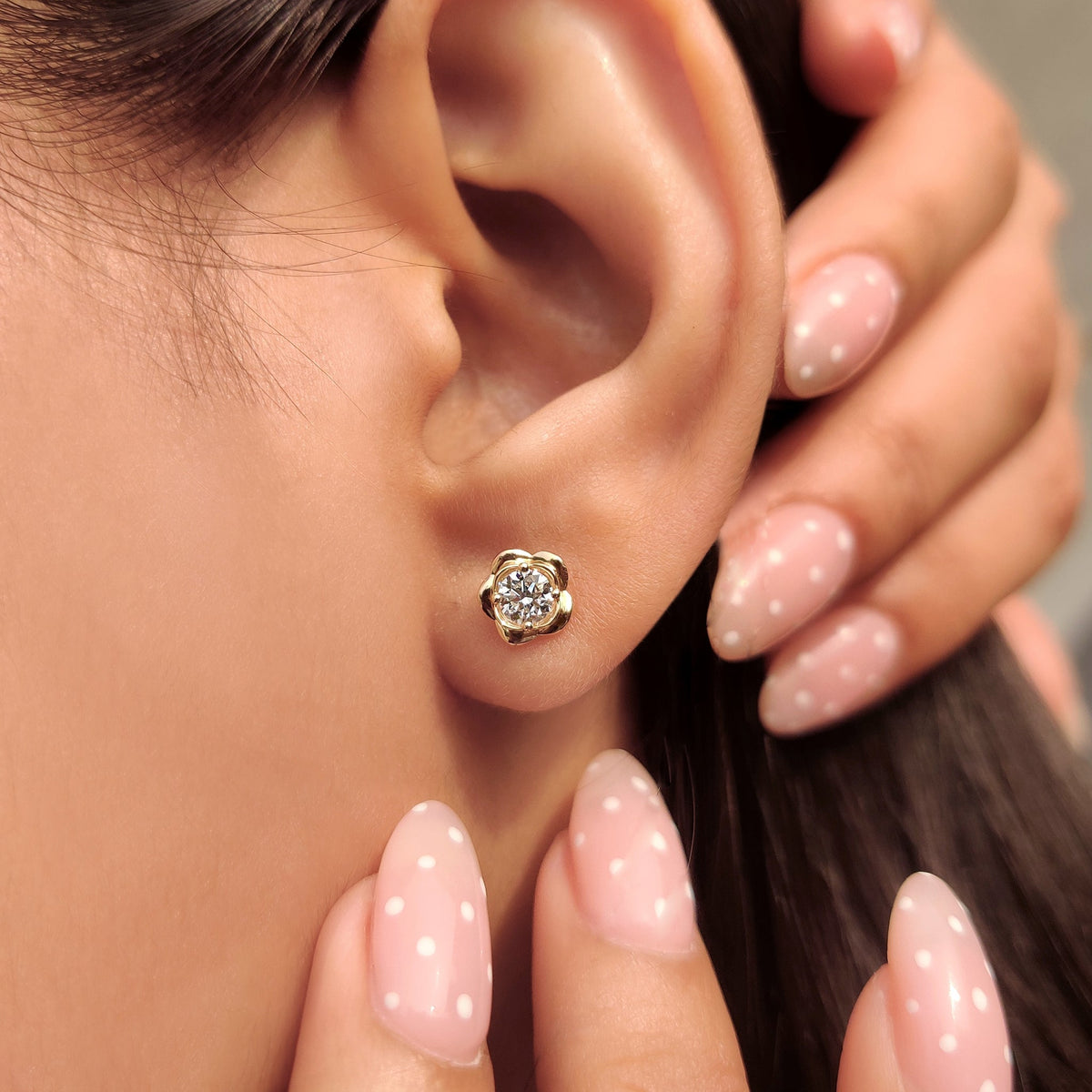 Lab grown round diamond flower earrings.