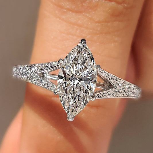 Marquise cut lab grown diamond ring with split shank.