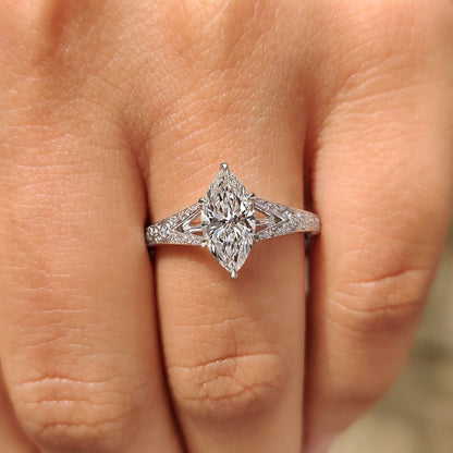 Lab grown marquise diamond ring with vintage tulip setting.