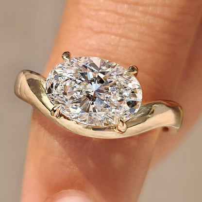 Oval cut diamond ring in east to west setting