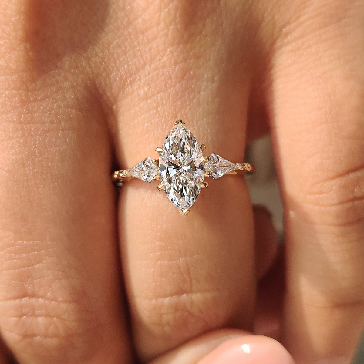 Marquise diamond ring with art deco design and filigree work